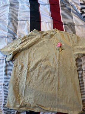 Rebellious One Mustard Crewneck Tee with Pink Mushroom Accent